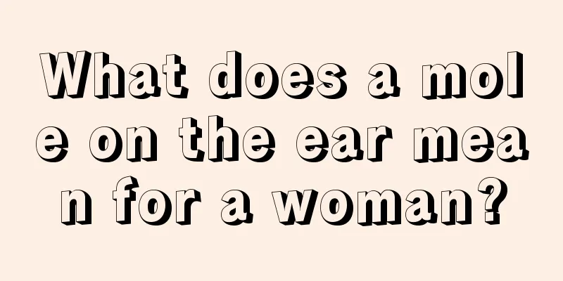 What does a mole on the ear mean for a woman?