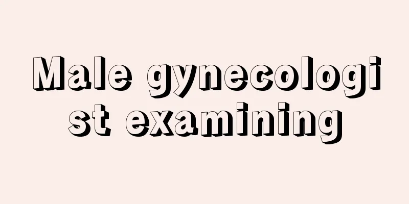 Male gynecologist examining