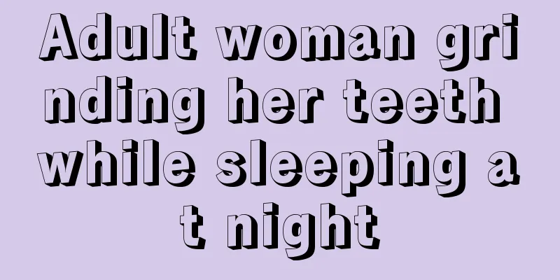 Adult woman grinding her teeth while sleeping at night