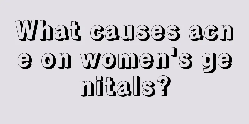 What causes acne on women's genitals?