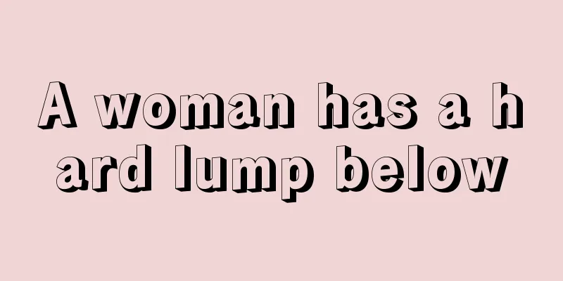 A woman has a hard lump below