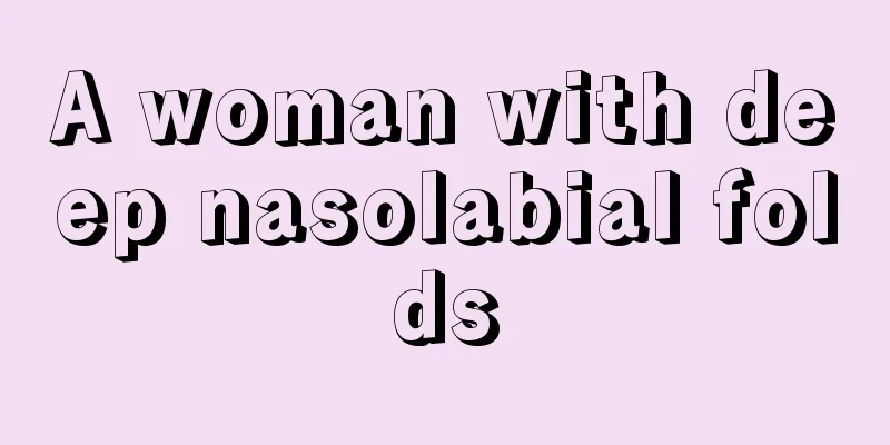 A woman with deep nasolabial folds