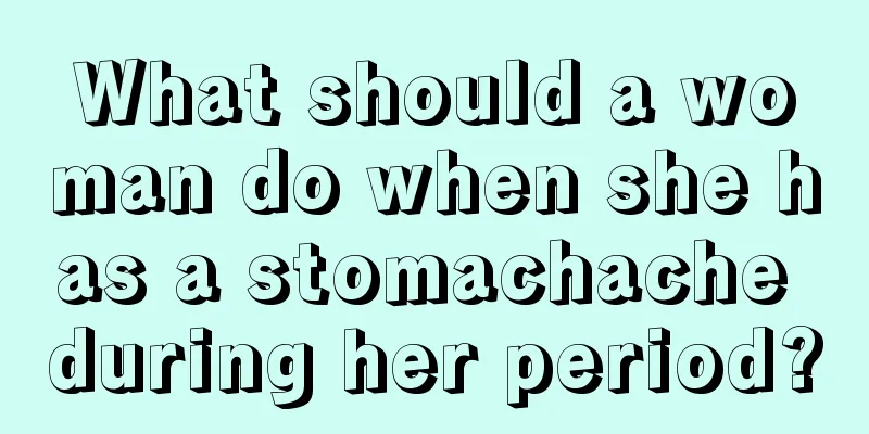 What should a woman do when she has a stomachache during her period?