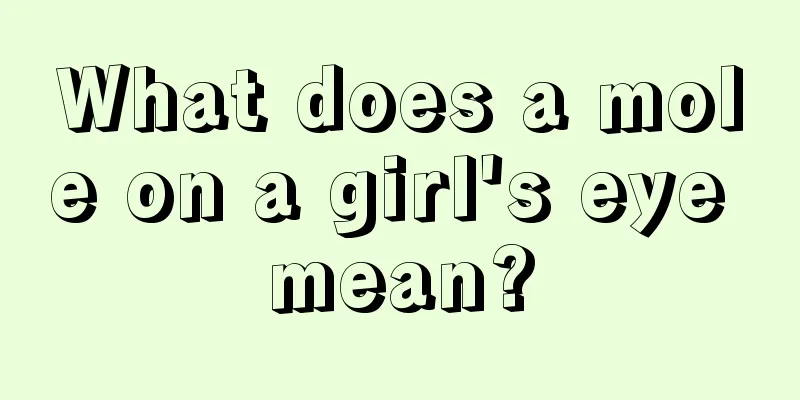 What does a mole on a girl's eye mean?