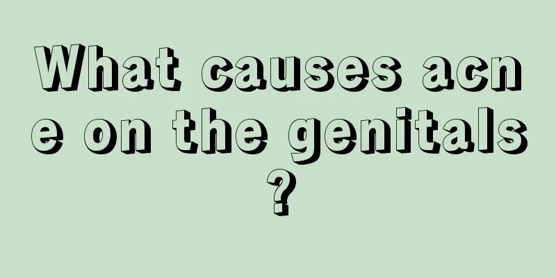 What causes acne on the genitals?