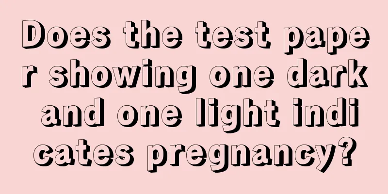 Does the test paper showing one dark and one light indicates pregnancy?