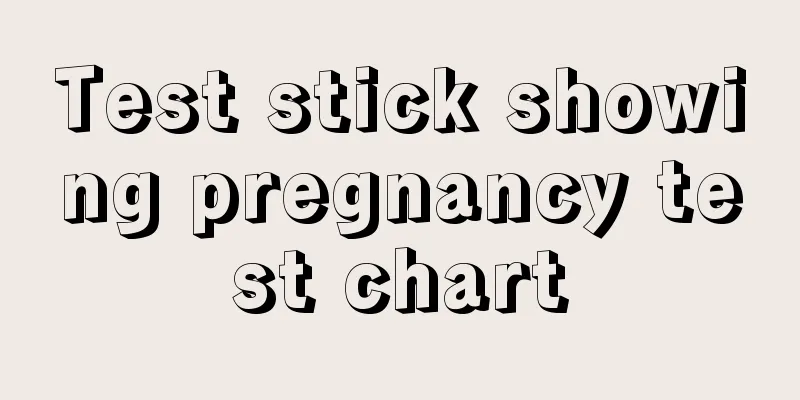 Test stick showing pregnancy test chart