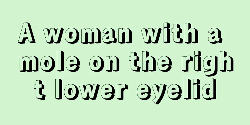 A woman with a mole on the right lower eyelid