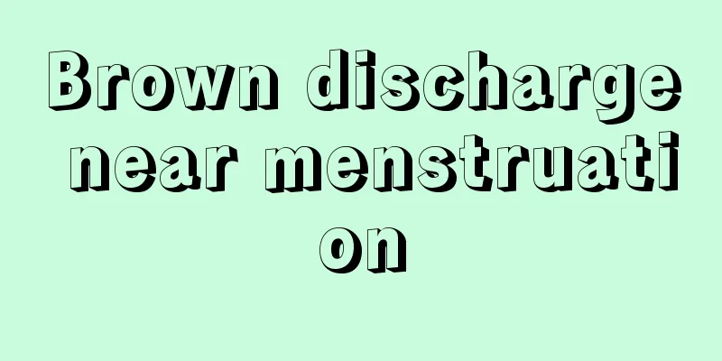 Brown discharge near menstruation