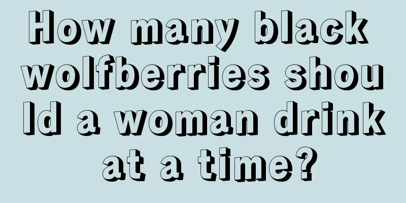 How many black wolfberries should a woman drink at a time?