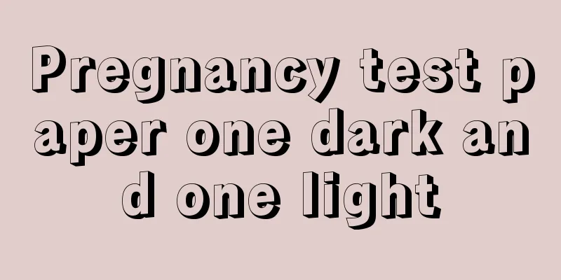 Pregnancy test paper one dark and one light