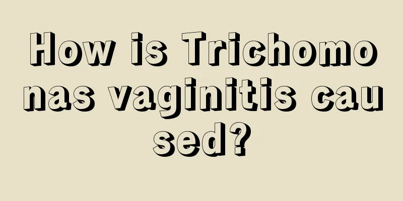 How is Trichomonas vaginitis caused?