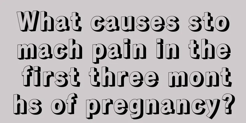 What causes stomach pain in the first three months of pregnancy?