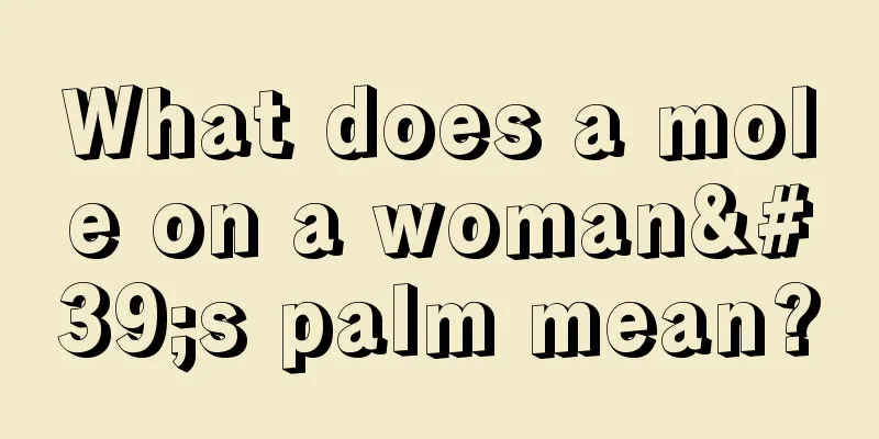 What does a mole on a woman's palm mean?