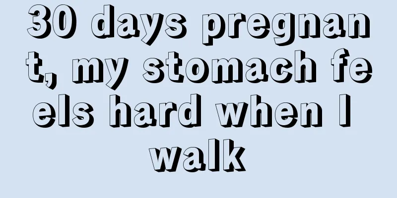 30 days pregnant, my stomach feels hard when I walk