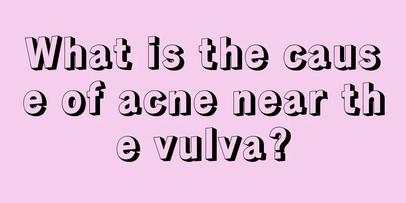 What is the cause of acne near the vulva?