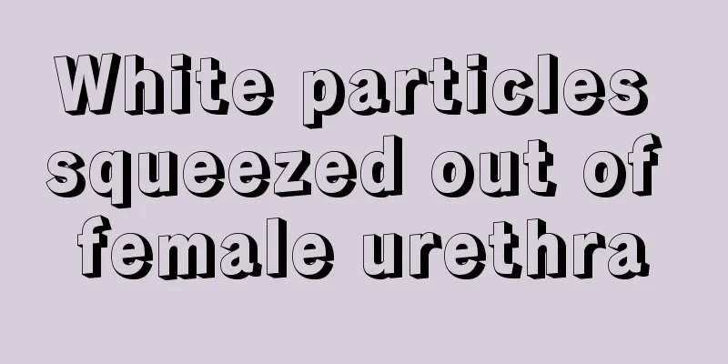 White particles squeezed out of female urethra