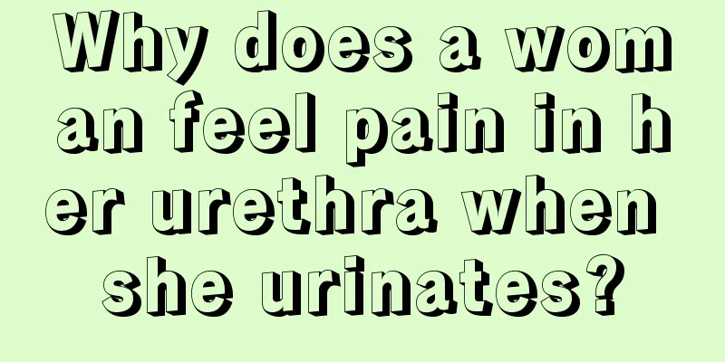 Why does a woman feel pain in her urethra when she urinates?