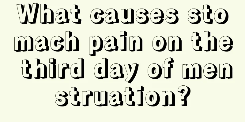 What causes stomach pain on the third day of menstruation?