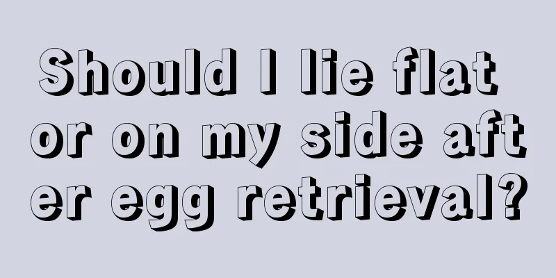 Should I lie flat or on my side after egg retrieval?