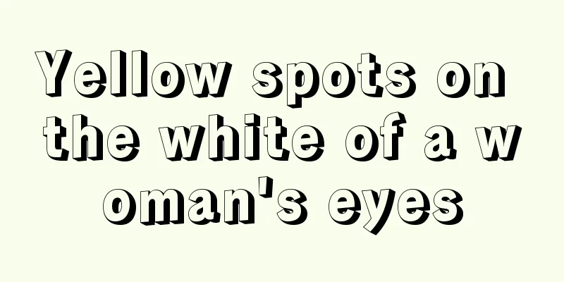 Yellow spots on the white of a woman's eyes