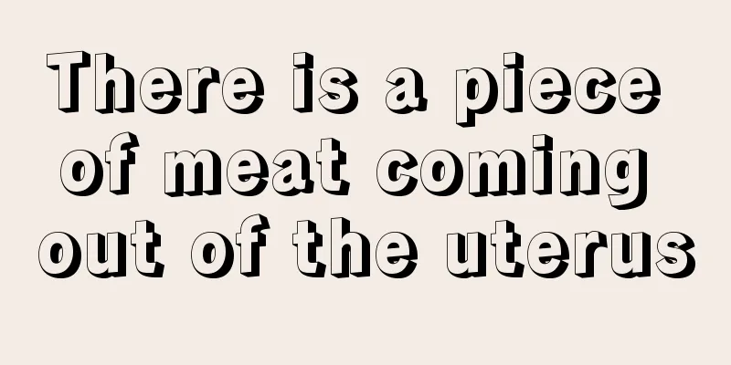 There is a piece of meat coming out of the uterus