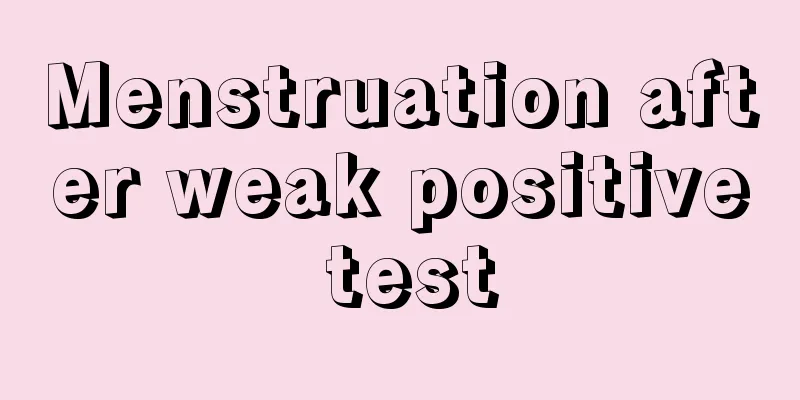 Menstruation after weak positive test