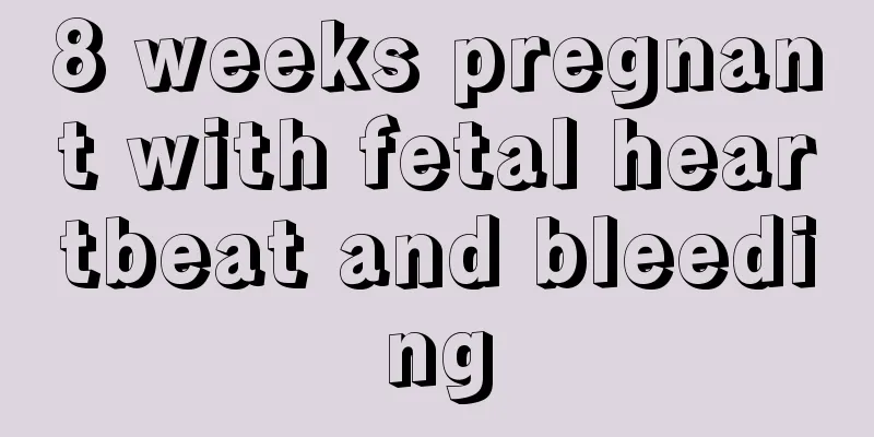 8 weeks pregnant with fetal heartbeat and bleeding