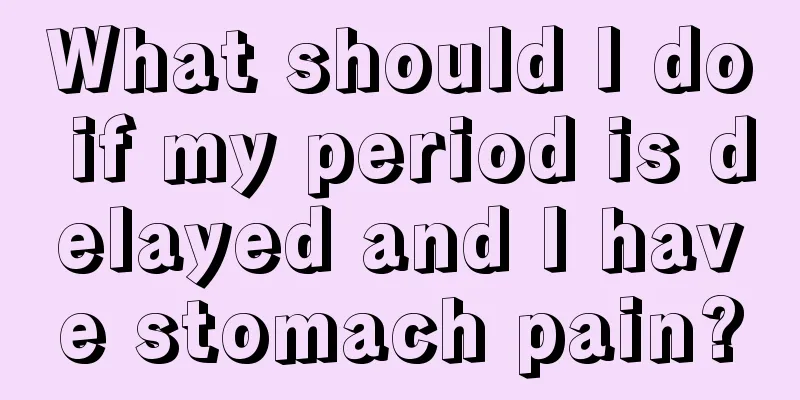 What should I do if my period is delayed and I have stomach pain?