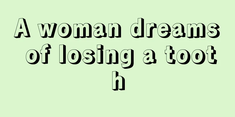 A woman dreams of losing a tooth