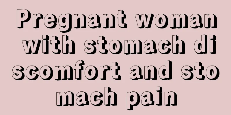 Pregnant woman with stomach discomfort and stomach pain