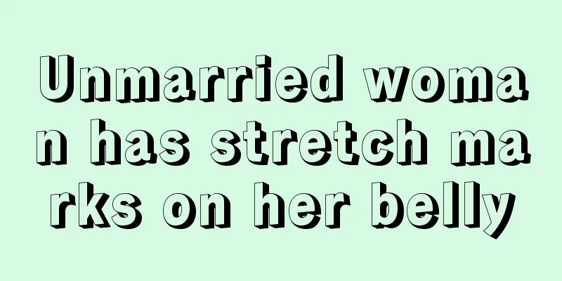 Unmarried woman has stretch marks on her belly