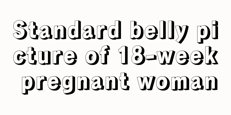 Standard belly picture of 18-week pregnant woman