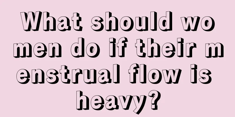 What should women do if their menstrual flow is heavy?