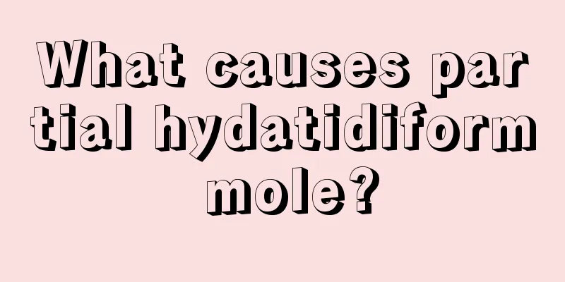 What causes partial hydatidiform mole?