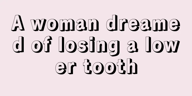 A woman dreamed of losing a lower tooth