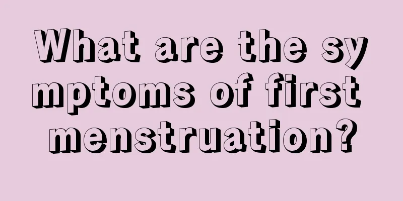 What are the symptoms of first menstruation?