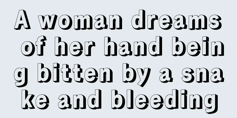 A woman dreams of her hand being bitten by a snake and bleeding