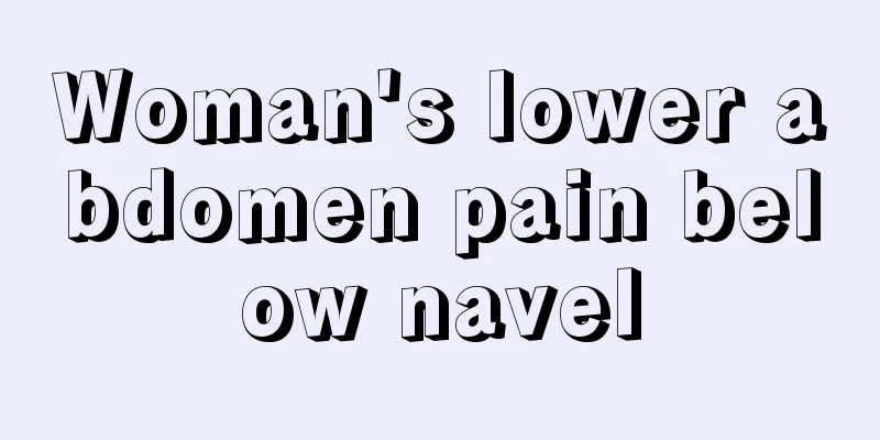 Woman's lower abdomen pain below navel