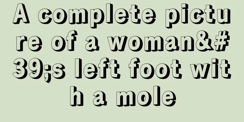 A complete picture of a woman's left foot with a mole