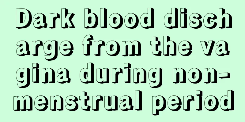 Dark blood discharge from the vagina during non-menstrual period