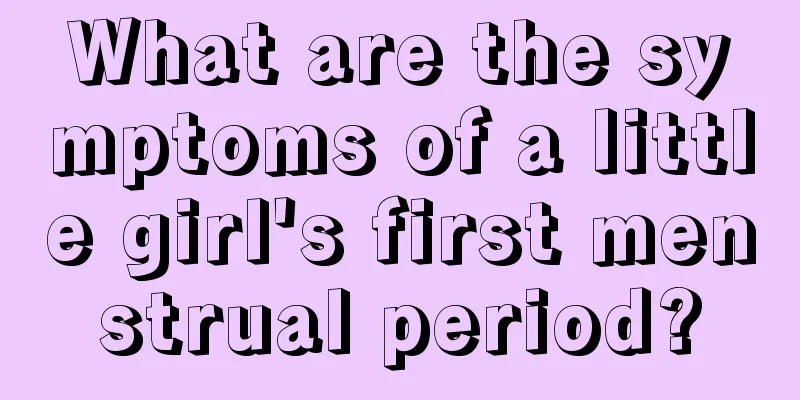 What are the symptoms of a little girl's first menstrual period?