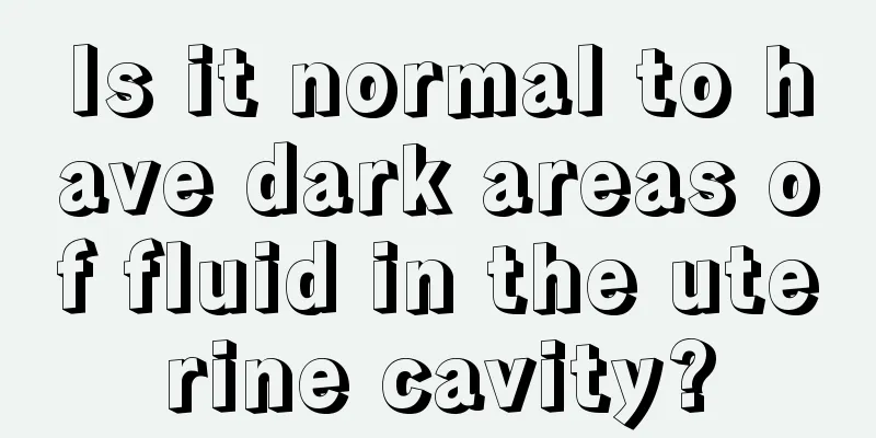 Is it normal to have dark areas of fluid in the uterine cavity?