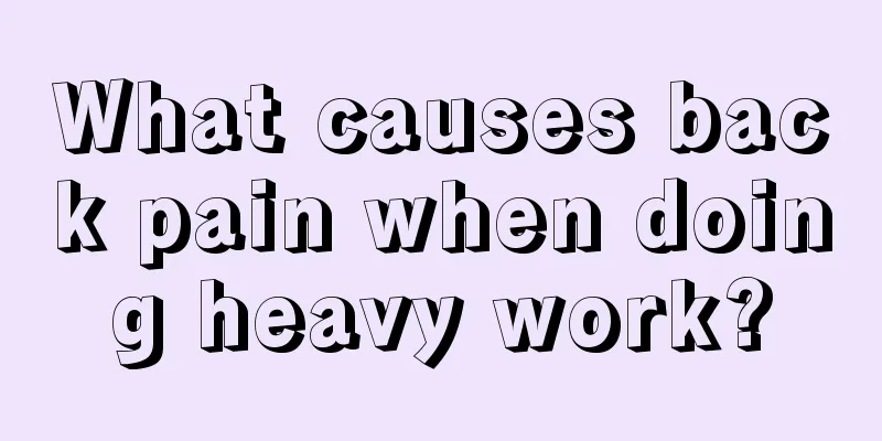 What causes back pain when doing heavy work?