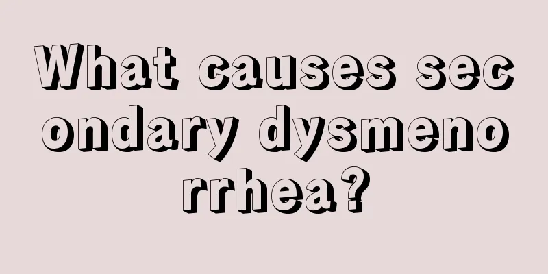 What causes secondary dysmenorrhea?