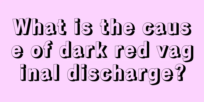 What is the cause of dark red vaginal discharge?