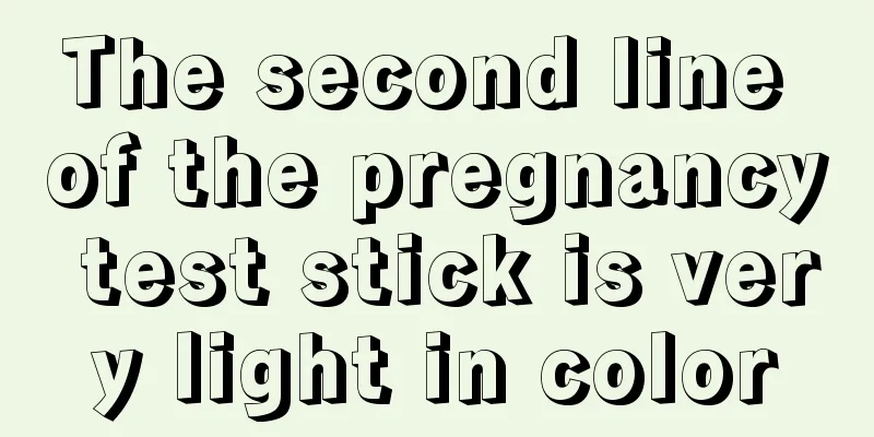 The second line of the pregnancy test stick is very light in color