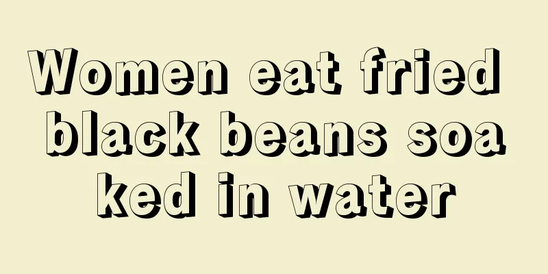 Women eat fried black beans soaked in water