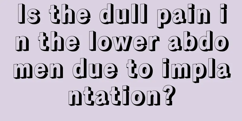 Is the dull pain in the lower abdomen due to implantation?