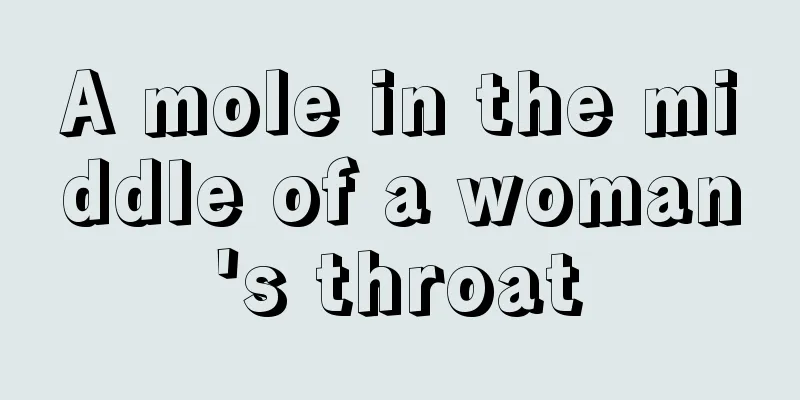 A mole in the middle of a woman's throat